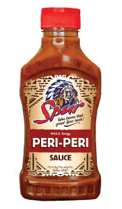 Spur Peri-Peri Sauce, mild and tangy, in a Spur branded sauce bottle.
